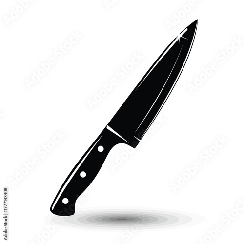 A sharp, black chefs knife with a white handle, isolated on a