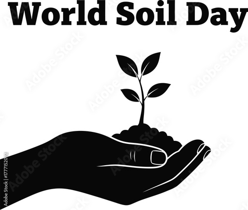 Hand holding plant for world soil day
