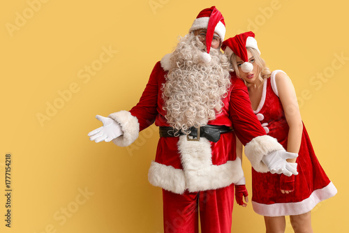 Funny people dressed as San...
