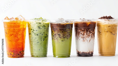 A collection of Asian cold drinks, including Thai iced tea, matcha latte, iced chocolate, and coffee varieties, displayed in transparent to-go cups against a white backdrop. 