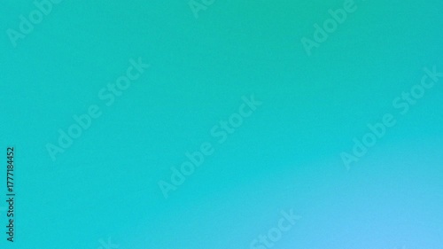 Gradient of light blue to turquoise color transition in a smooth and blurred abstract background
