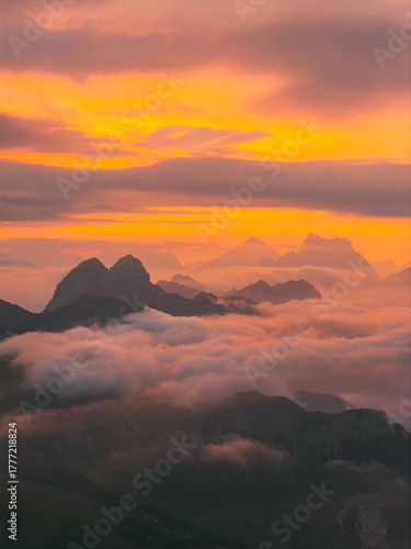 Mountains at sunset with clouds in the foreground