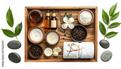 Spa setup oils, salts, stones, flowers, and candles on wood