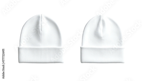 Two white beanie hats, identical, on a black background