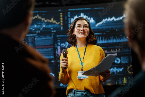 woman is giving a presentation at conference