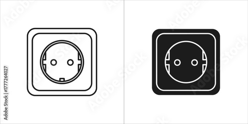 Two electrical socket outlets, one outlined and one solid black