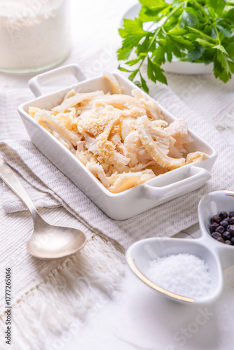 Fresh cooked tripes, cutted into stripes with herbs for cooking