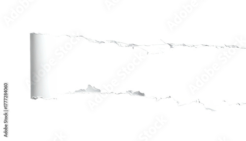 Torn, curling white paper with black background revealed