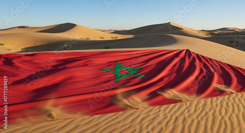 Large Moroccan Flag Draped Over Golden Sand Dunes in the Sahara Desert at Sunset, Representing Travel, Culture, and Freedom.