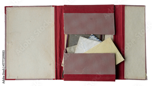 open red file folder with antique paper envelopes inside on white