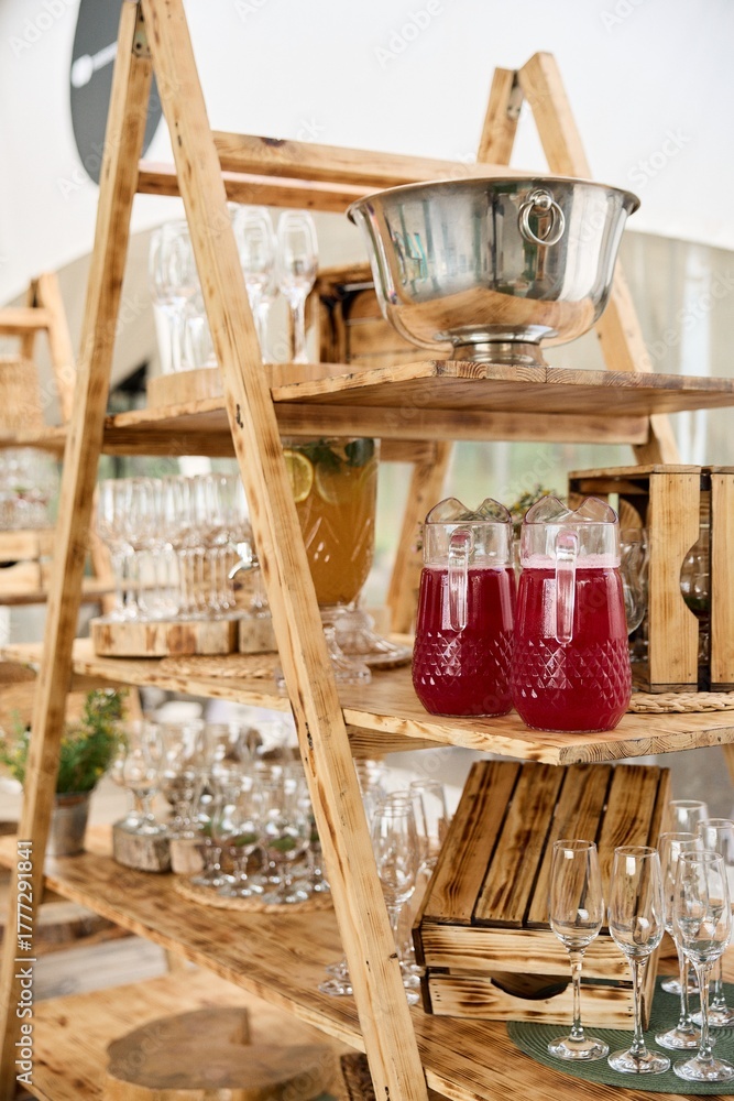 Fototapeta premium Rustic drink station with glassware and beverages