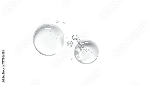 Clear liquid drops cluster on black