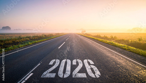 Wallpaper Mural Misty countryside highway at dawn with 2026 painted on road, symbolizing journey into future Torontodigital.ca