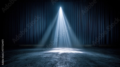 Spotlight on Empty Stage with Dark Curtains and Light Beam Effect