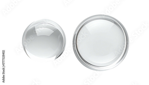 Two white glass-like buttons, one circular, one dome-shaped