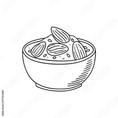 Bowl containing roasted almonds mixed with sesame seeds