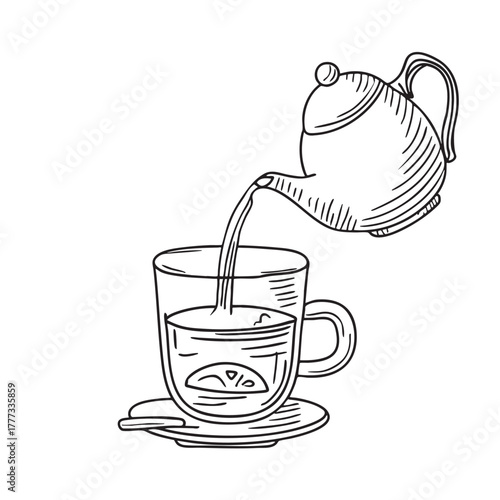 Glass cup of strong hot tea poured from above