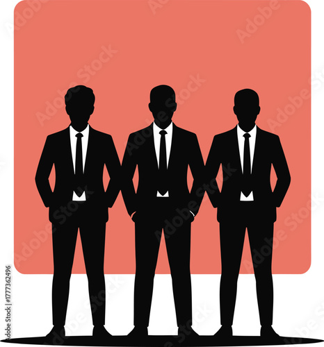 Confident business trio in suits on coral background