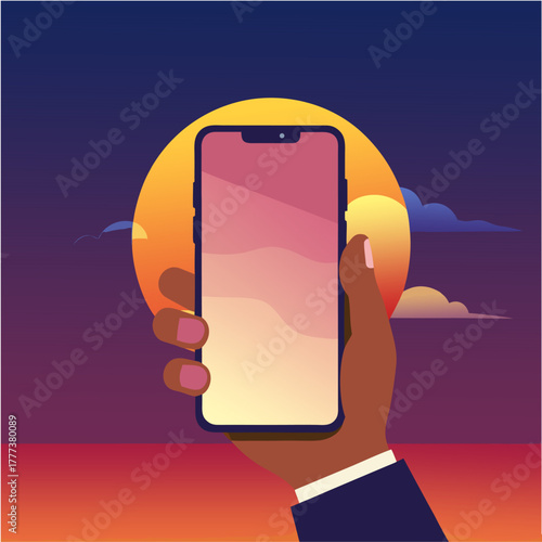 “Hand holding smartphone at sunset”