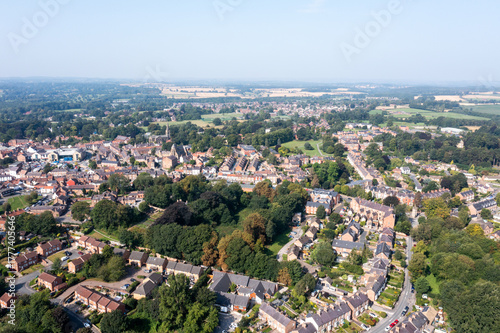 Wallpaper Mural Aerial drone photo of the village of Ripon in North Yorkshire in the UK showing the historic British village and streets full of rows of terrace houses in the summer time Torontodigital.ca