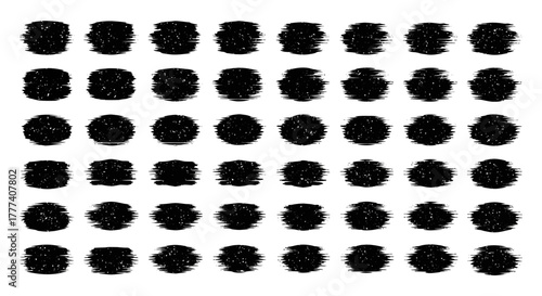 Grid of textured black oval shapes with white speckles organized in neat rows and columns