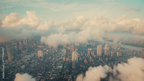 Starting at sunrise glow, camera gliding over metro grid and riverfront as clouds drifting eastward