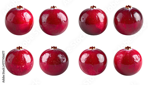Eight glossy, spherical, red cranberries on black