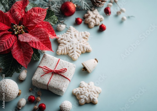 Festive Arrangement of Christmas Decorations and Cookies on Blue Background