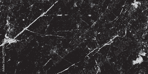 Dark grey textured background with white and light grey irregular streaks and speckles resembling distressed concrete or marble