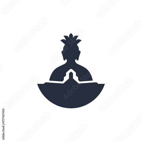 Silhouette of a meditating person with a crown in a spiritual pose