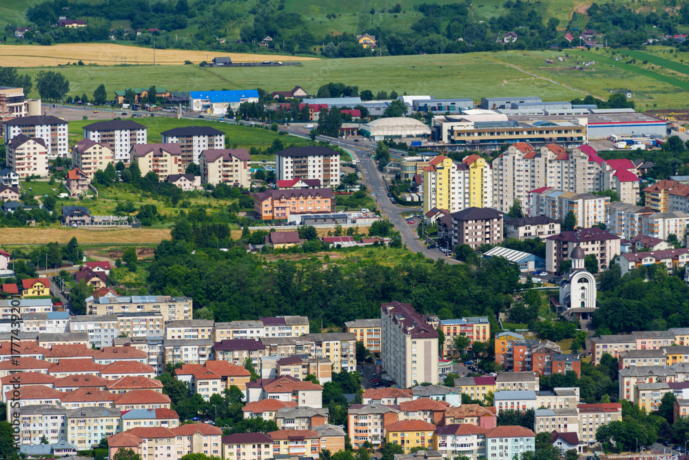 Fototapeta premium panoramic view from above on the street of city Piatra Neamt, Romania, city architecture, urban landscape