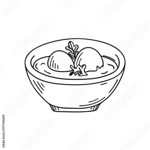 Clay bowl filled with tomato stew served alongside poached eggs