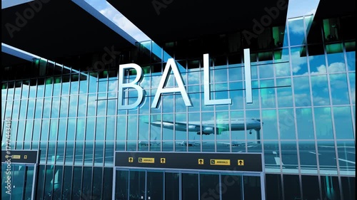 Airlane landing at Bali. Arrival in the city with reflection of airport and aircraft