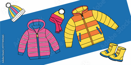 A product shot featuring a collection of children's winter clothing items arranged on a solid blue backdrop. The main subjects are various brightly colored winter jackets, knitted hats, scarves, and p