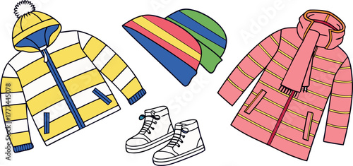 A product shot featuring a collection of children's winter clothing items arranged on a solid blue backdrop. The main subjects are various brightly colored winter jackets, knitted hats, scarves, and p