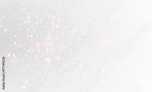 Magic glitter dust glowing sparkle shining softly across golden festive background.
