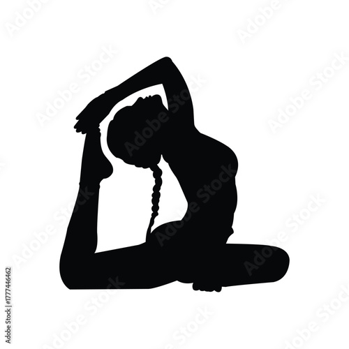 Silhouette of a woman doing stretching yoga excerise