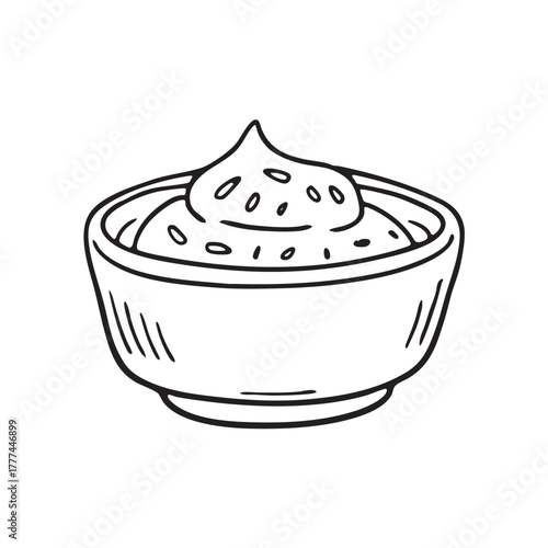 Small dipping bowl featuring a blend of garlic cumin and lemon