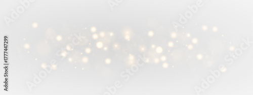 Magic golden dust sparkle particles floating softly under bright starlight.
