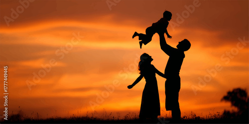 Silhouette of a happy family with father throwing child in the air at sunset