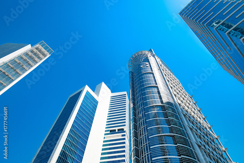 skyscrapers against the blue sky, bottom view, in big city