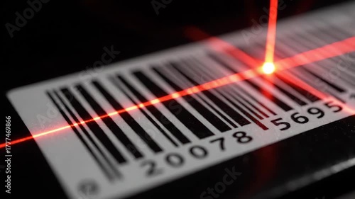Close up view of sequential lines and numbers on product identification label against dark background