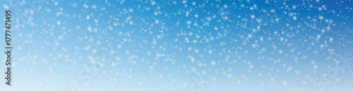 A realistic falling snow overlay on a blue gradient festive winter background with snowstorm and bokeh. A modern vector, white overlay with special light effect, for Christmas, New Year holiday design