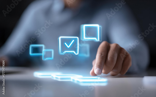 Businessman using virtual interface with glowing icon for customer feedback and approval. positive communication concept showing excellent satisfaction and quality service