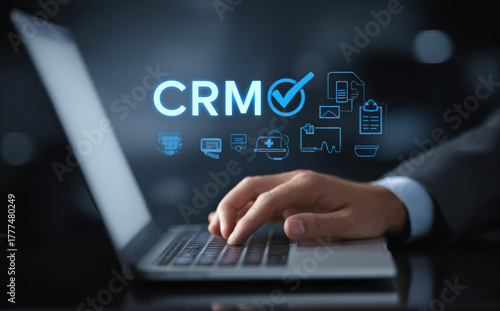 Focused businessman using CRM software for customer relationship management. professional working with business technology, data system, and marketing automation strategy