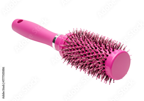 Bild auf Leinwand Isolated pink round hairbrush with stiff bristles for styling or detangling the