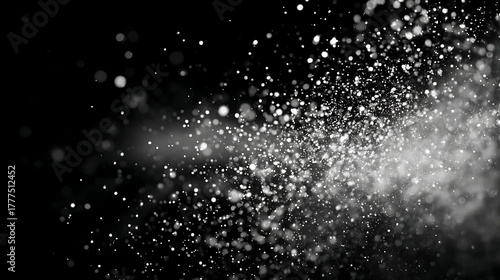 water splash on black background,Black and white background with abstract polka dots.