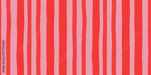 Hand drawn vertical stripes in vibrant red and soft pink create a playful and energetic background pattern
