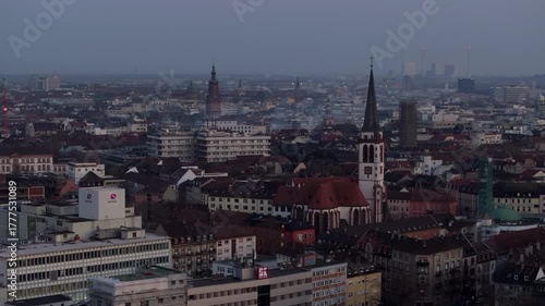 Wallpaper Mural Elevated panorama of Mannheim's urban landscape, showing historic architecture, church spires, and distant industrial chimneys Torontodigital.ca