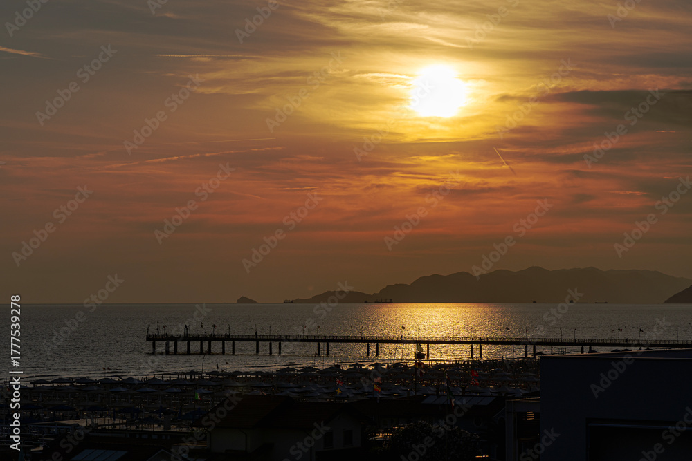 Obraz premium Seascape with sunset. Viareggio, Italy.